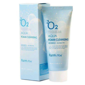 A tube of o2 premium aqua foam cleansing facial cleanser with its packaging box, promoting oxygenated water and all-skin-type compatibility.